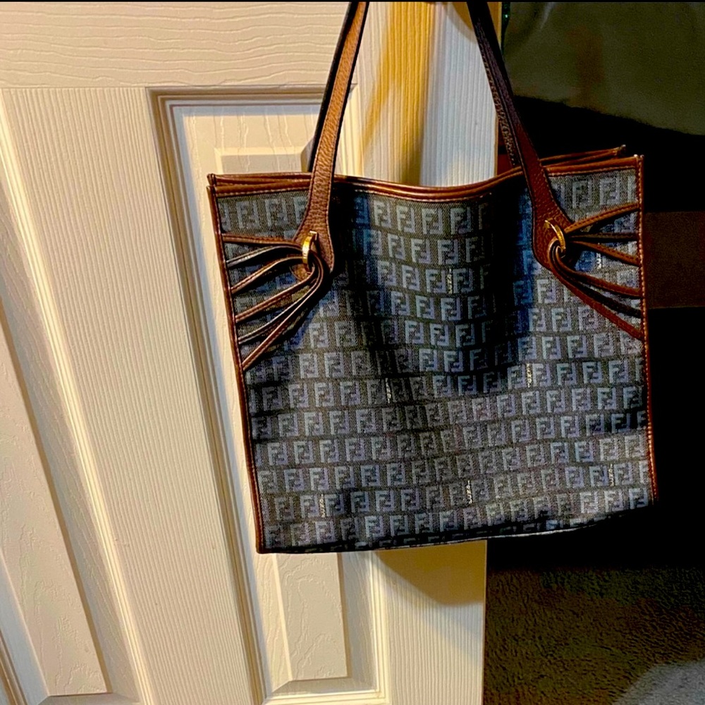 Denim Fendi bag. Size is medium .